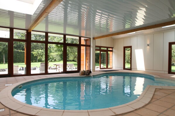 Indoor pool, open 8 AM to 7 PM, sun loungers
