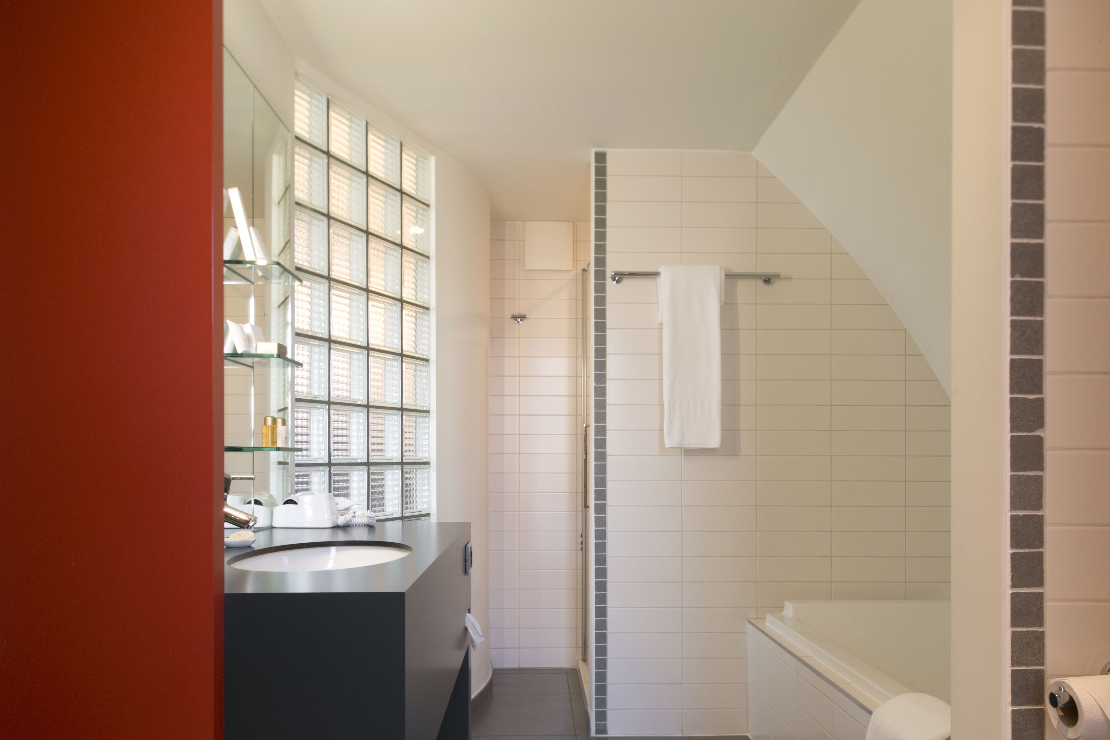 combined shower/bathtub, free toiletries, hair dryer, bathrobes