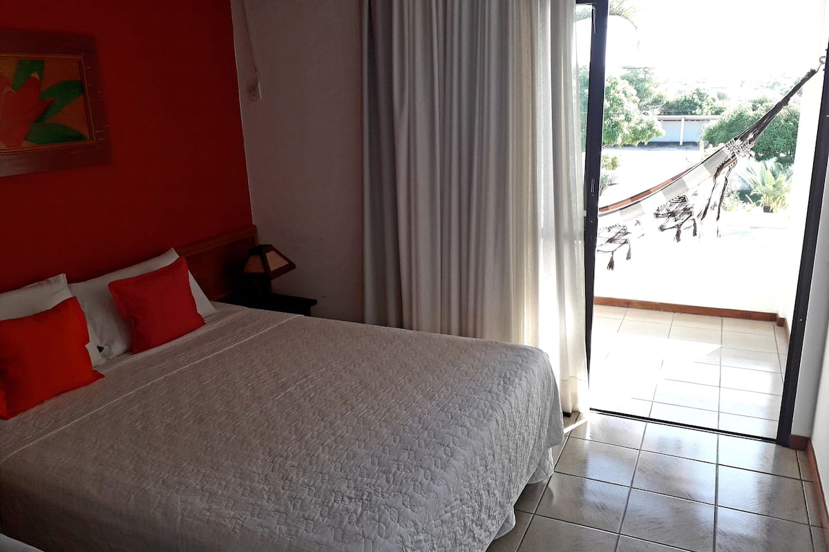 standard room, garden area | minibar, in-room safe, blackout curtains, iron/ironing board