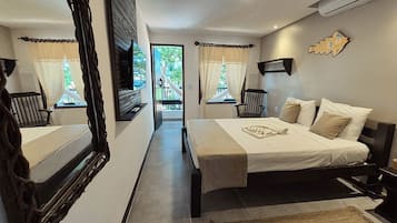 Phòng Deluxe, quang cảnh một góc biển | Minibar, két bảo mật tại phòng, trang trí khác biệt, màn/rèm cản sáng