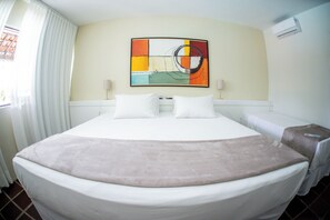 Habitación triple estándar | Minibar, caja fuerte, wifi gratis y ropa de cama