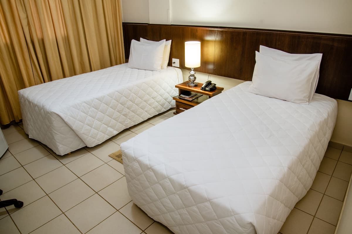 standard double or twin room | premium bedding, minibar, in-room safe, desk