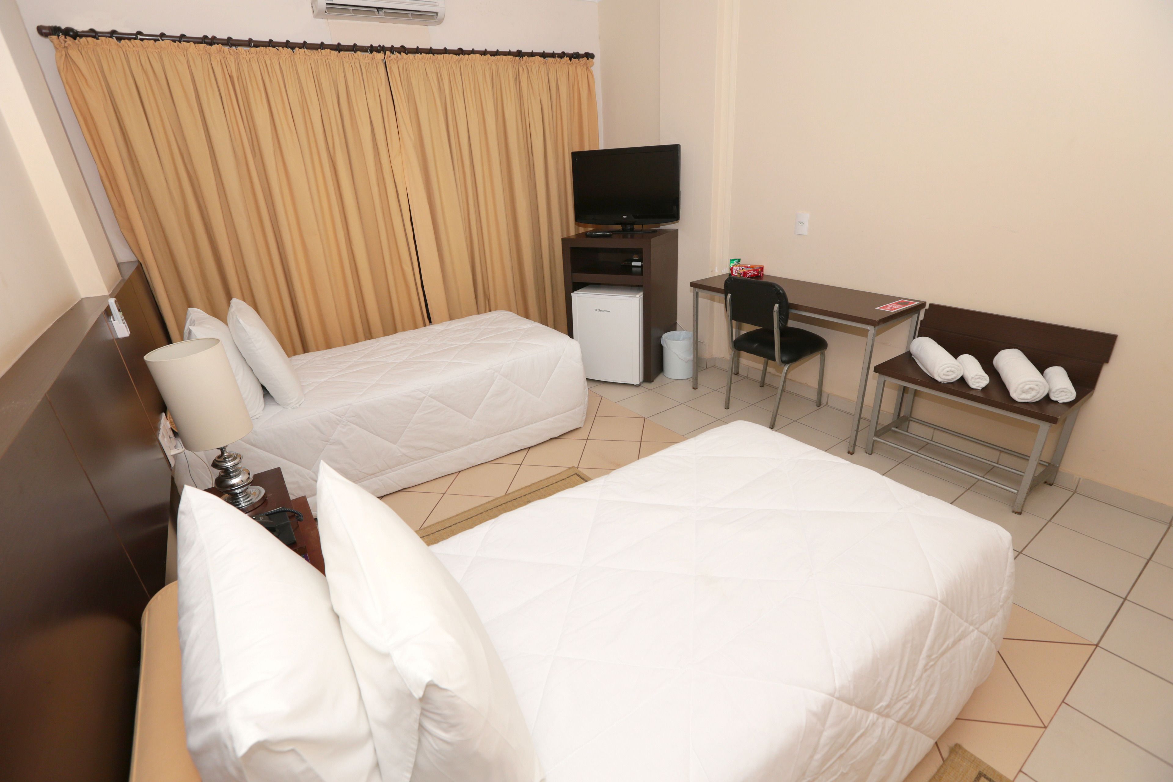 standard double or twin room | premium bedding, minibar, in-room safe, desk