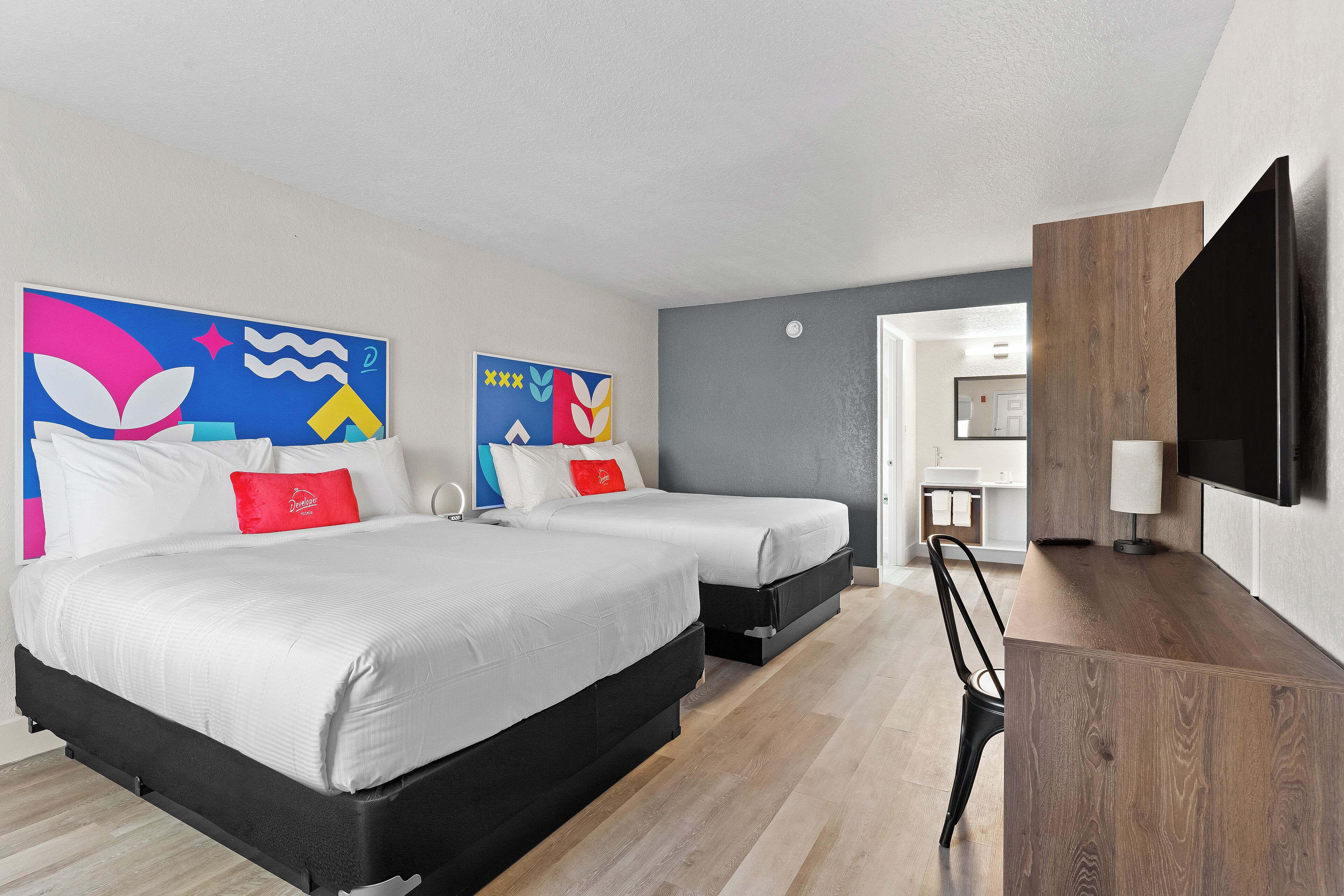 Room, 2 Queen Beds, Non Smoking | In-room safe, desk, laptop workspace, free cribs/infant beds