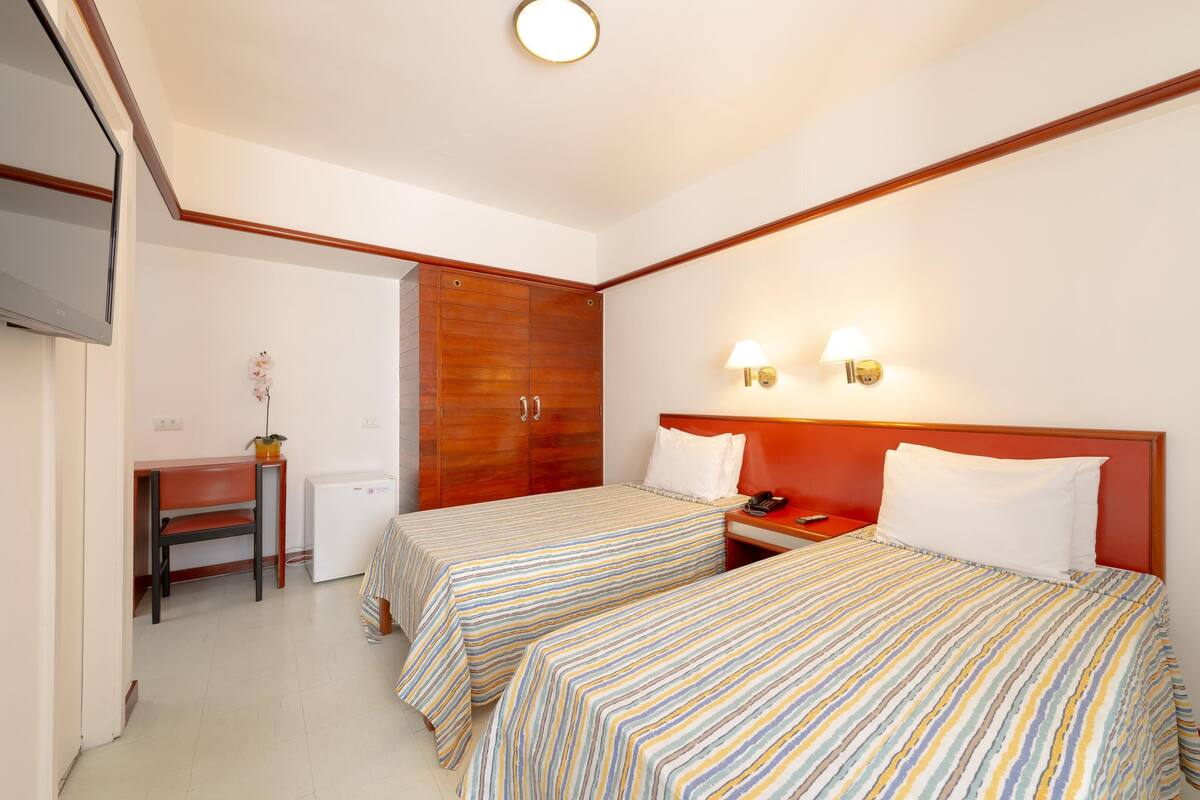Standard Twin Room, 2 Twin Beds | Minibar, desk, blackout drapes, free WiFi