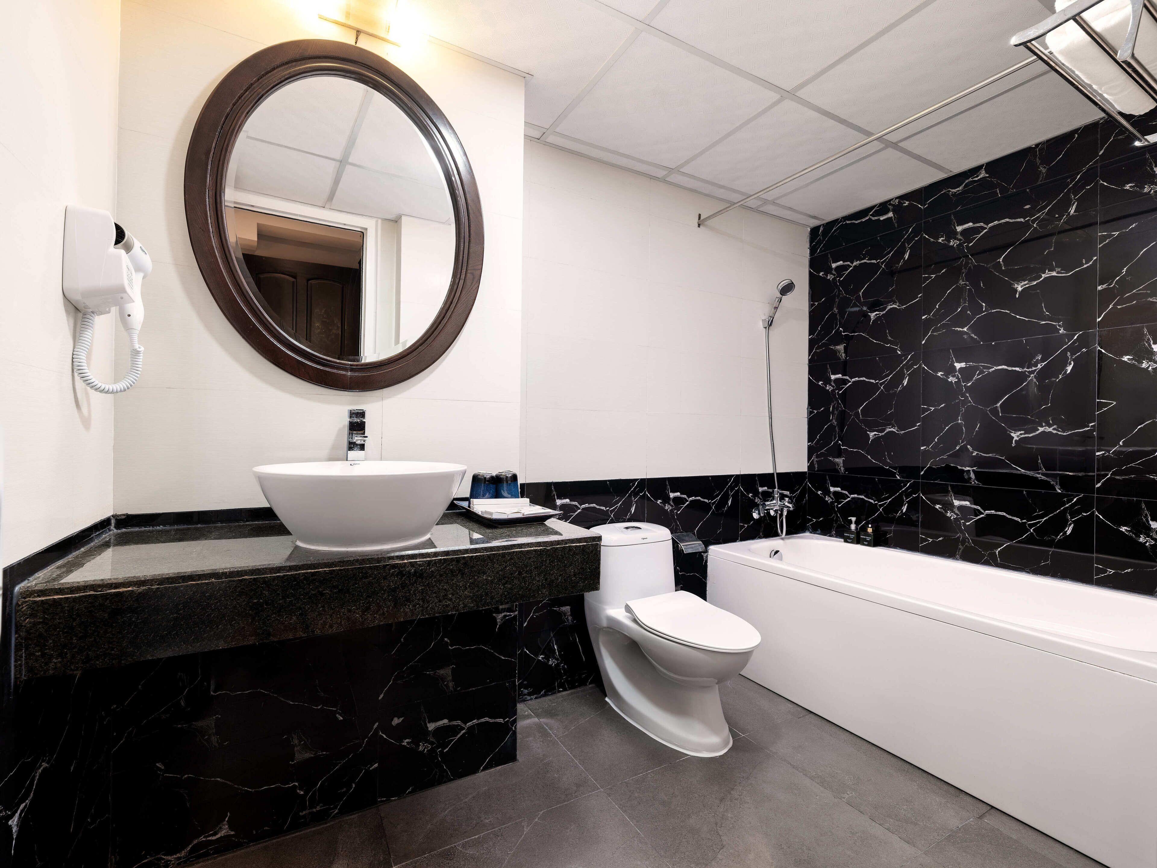 family triple room | bathroom | free toiletries, hair dryer, bathrobes, slippers