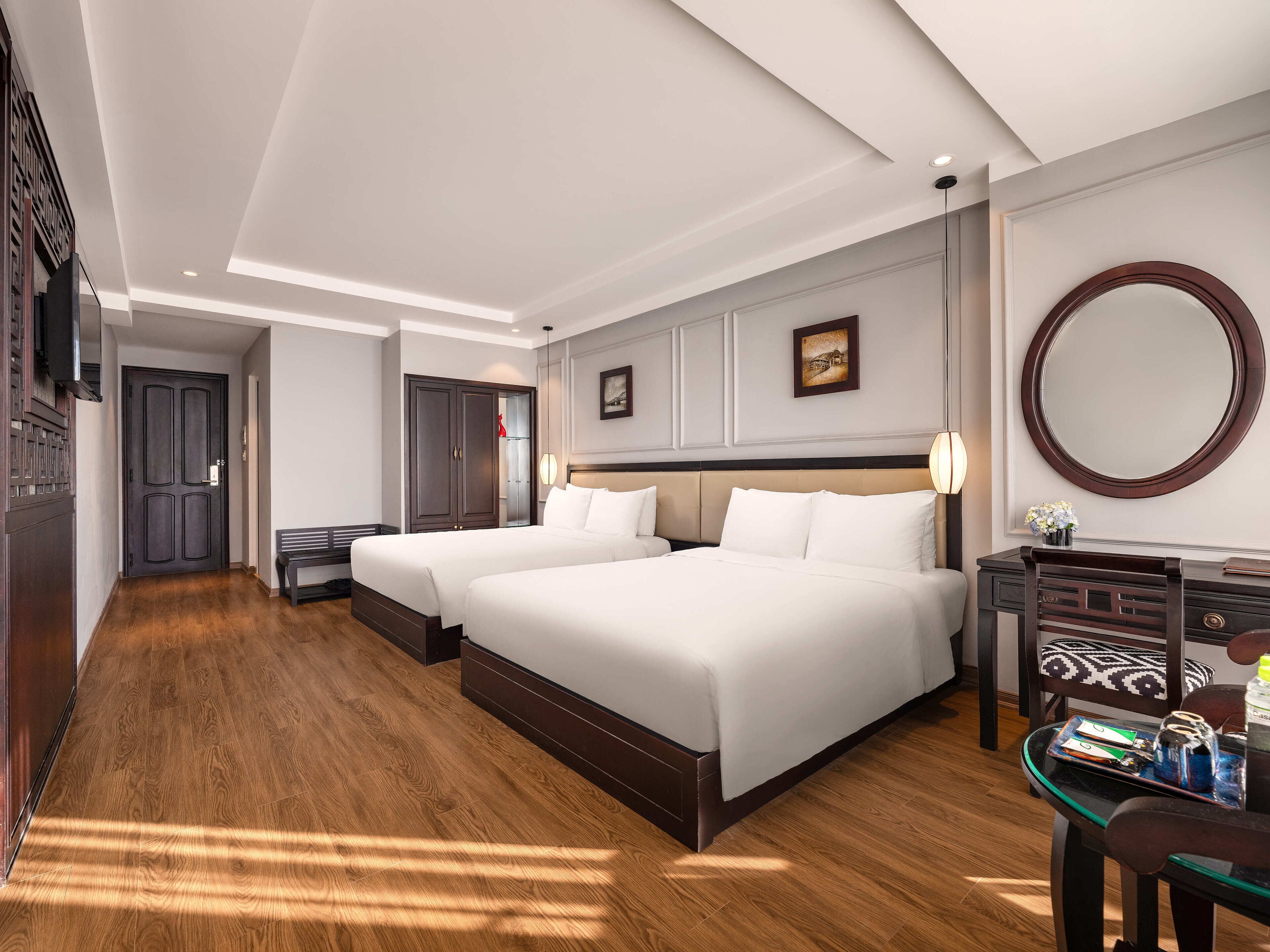 family quadruple room | down duvets, minibar, in-room safe, desk