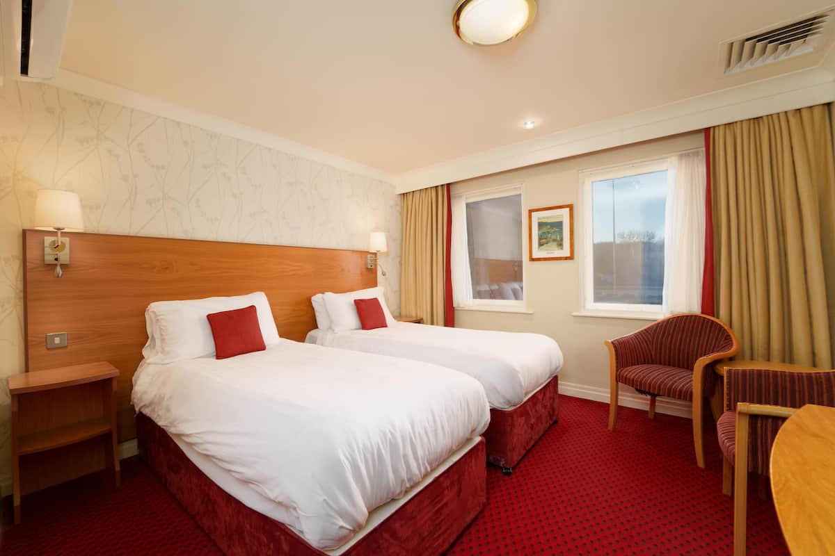 Premium bedding, pillowtop beds, in-room safe, desk