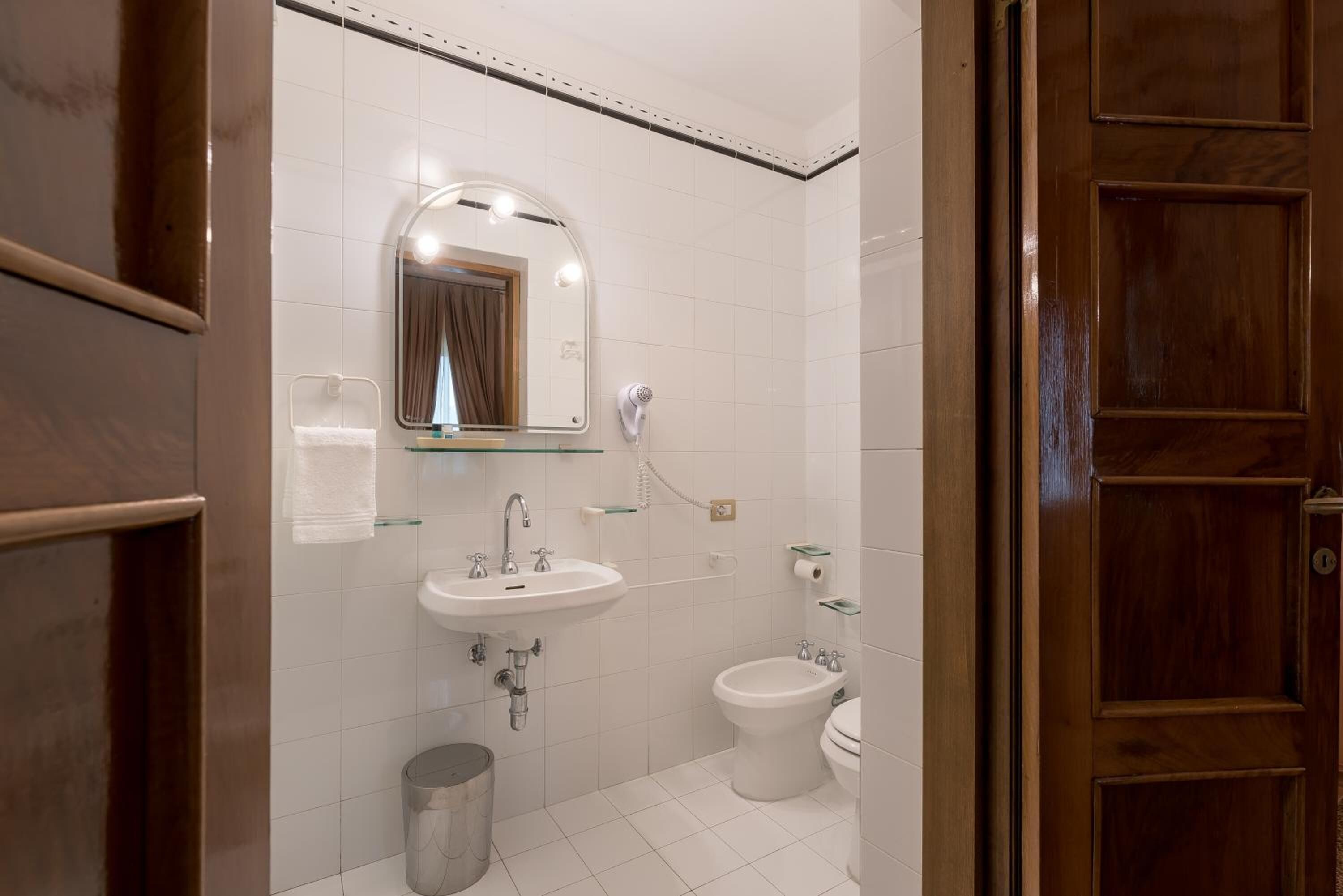 free toiletries, hair dryer, bidet, towels