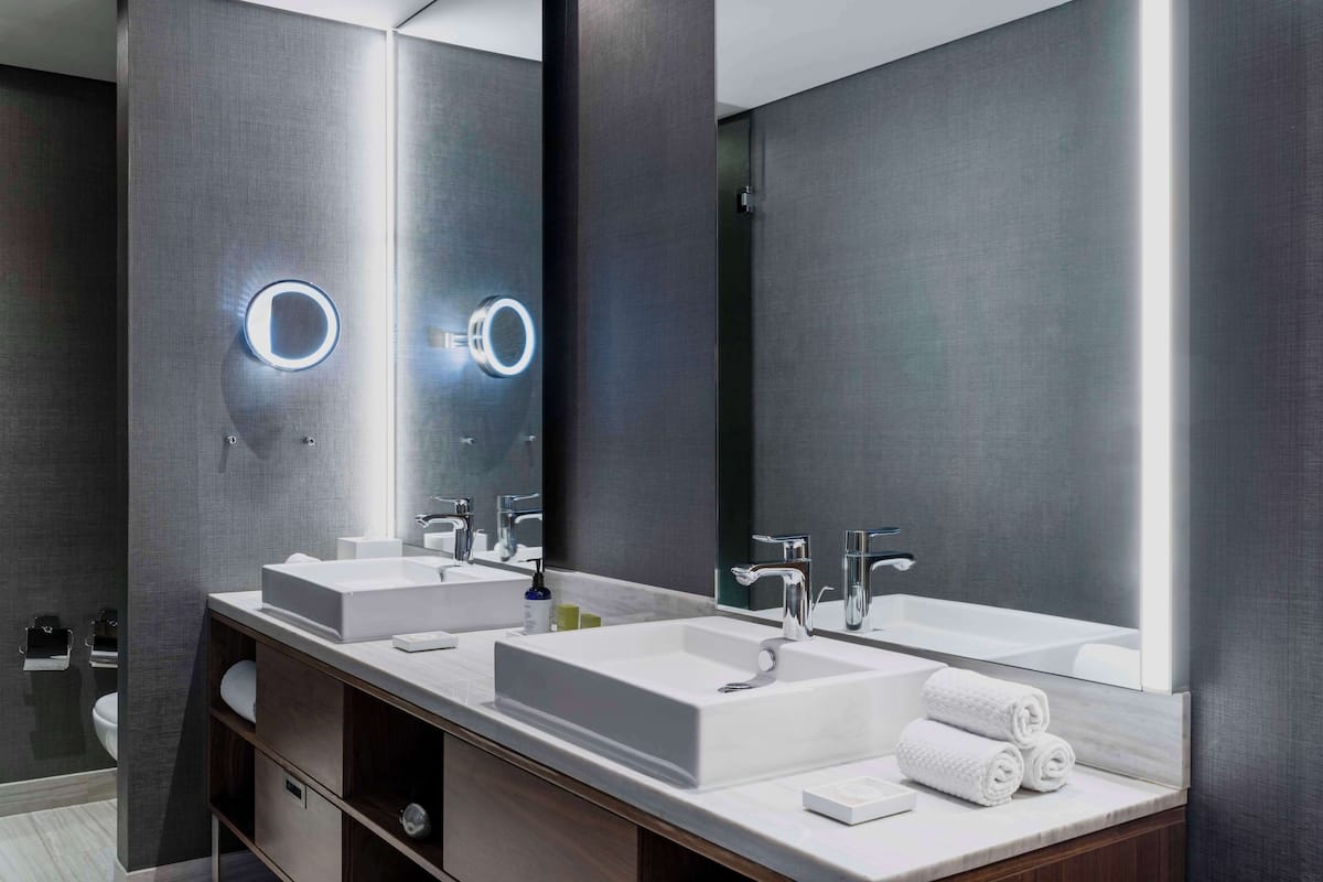 junior suite, 1 king bed | bathroom | shower, rainfall showerhead, free toiletries, hair dryer