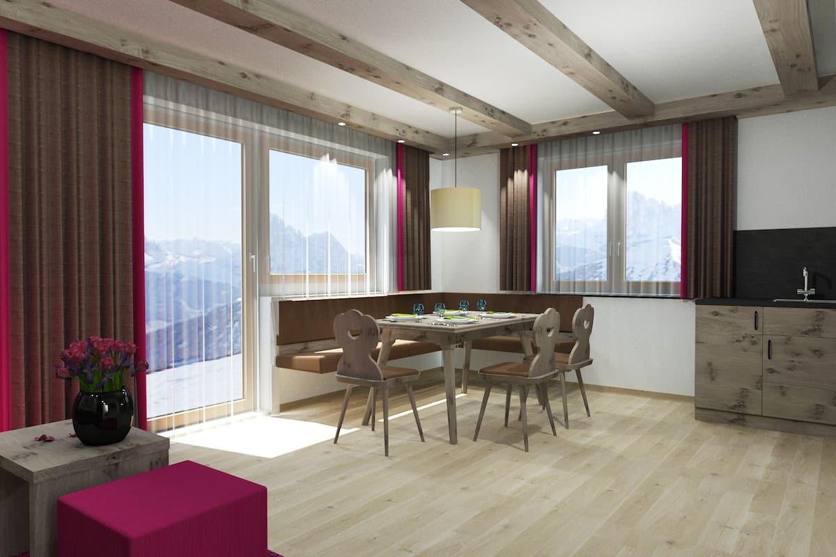 A modern living room with a dining table, chairs, a bench, and a TV.