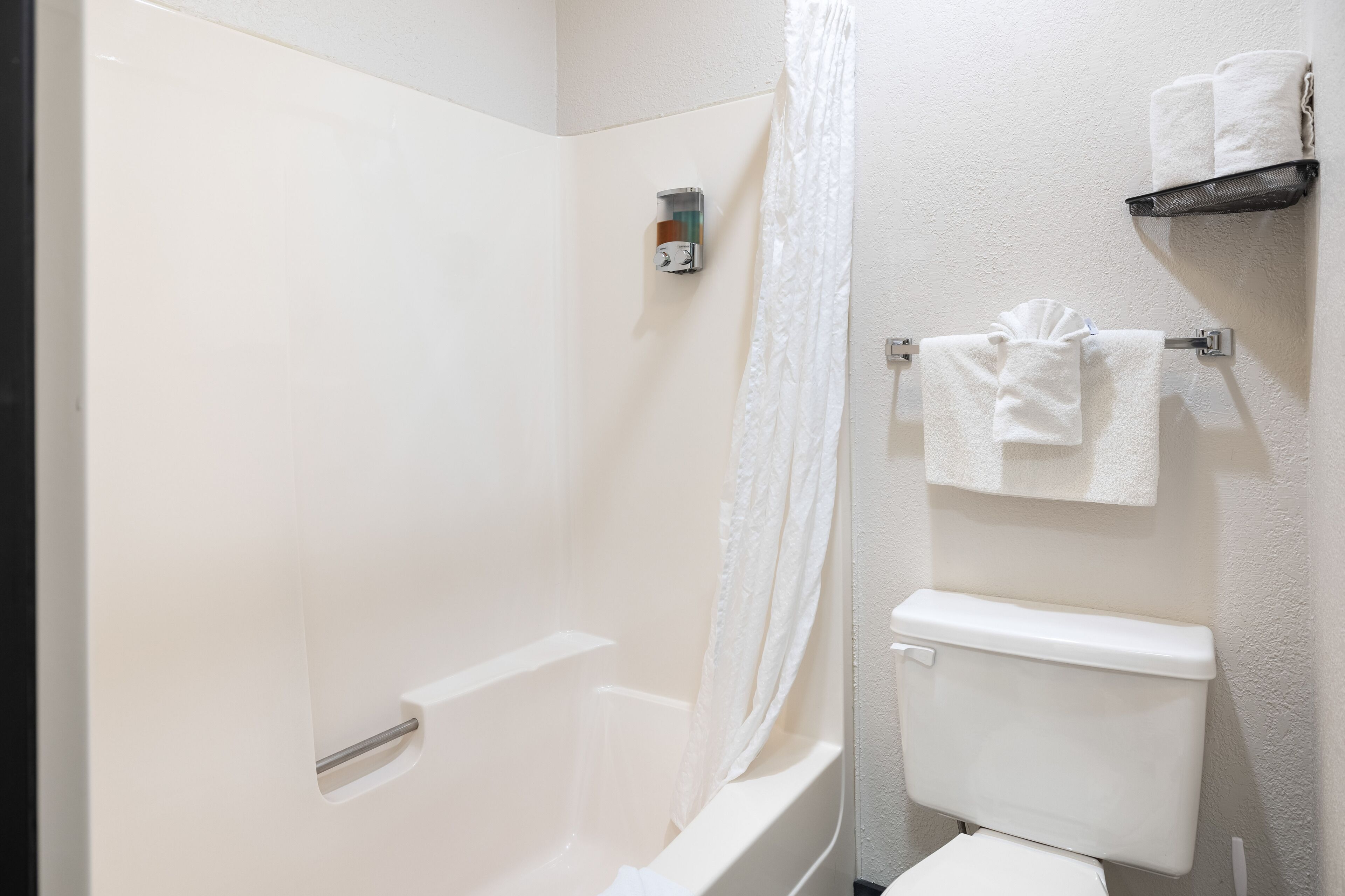 standard room, 2 queen beds | bathroom | combined shower/bathtub, rainfall showerhead, free toiletries
