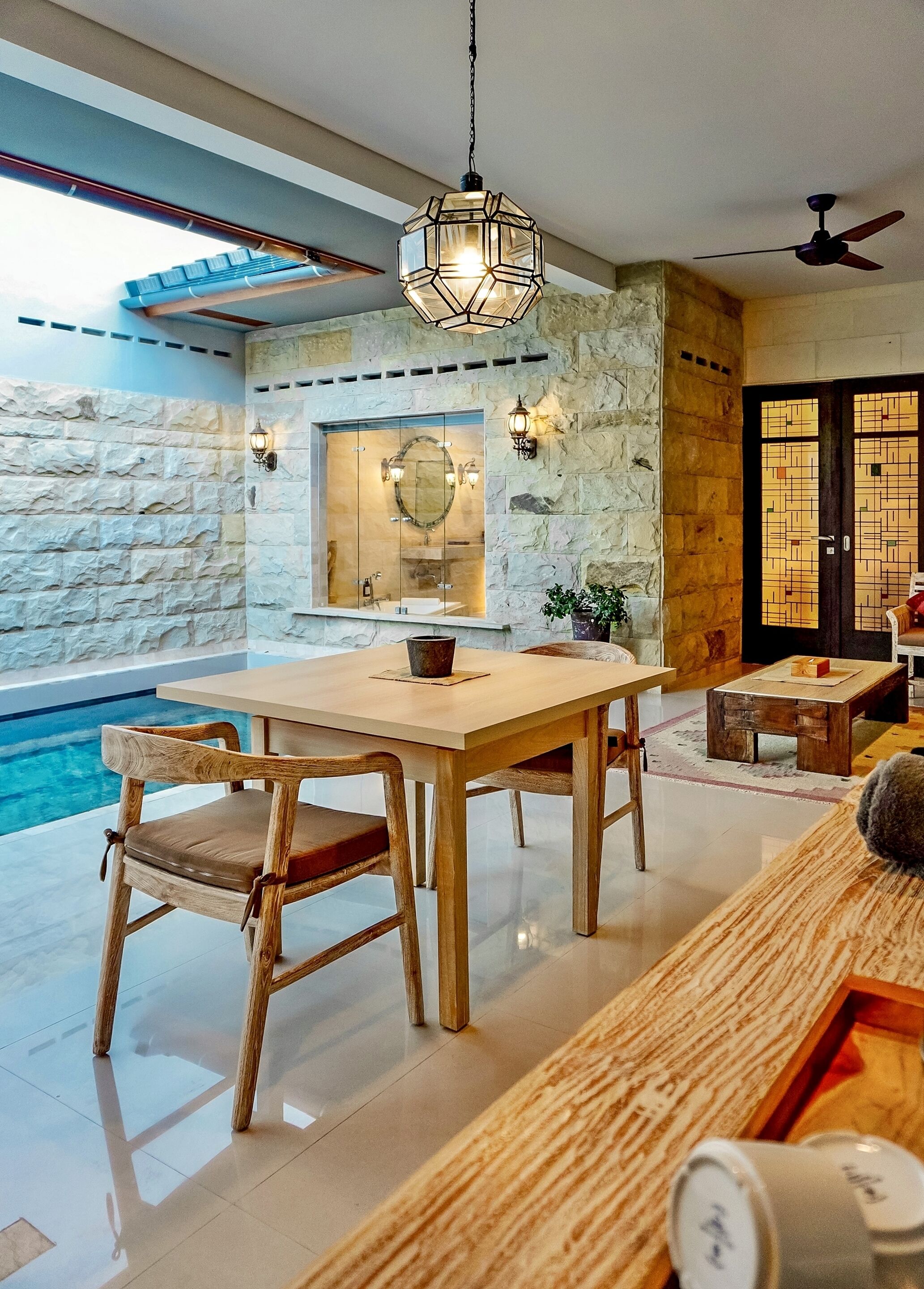Royal One Bedroom Pool Villa | Living area | 32-inch LCD TV with cable channels, TV, books