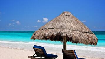 Beach nearby, white sand, free beach cabanas, sun loungers
