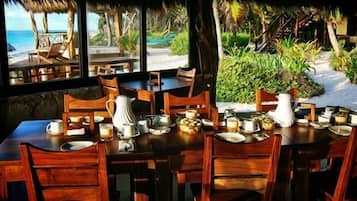 Breakfast, lunch, dinner served; beach views
