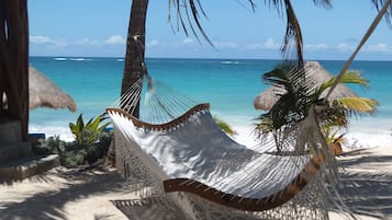Beach nearby, white sand, free beach cabanas, sun-loungers