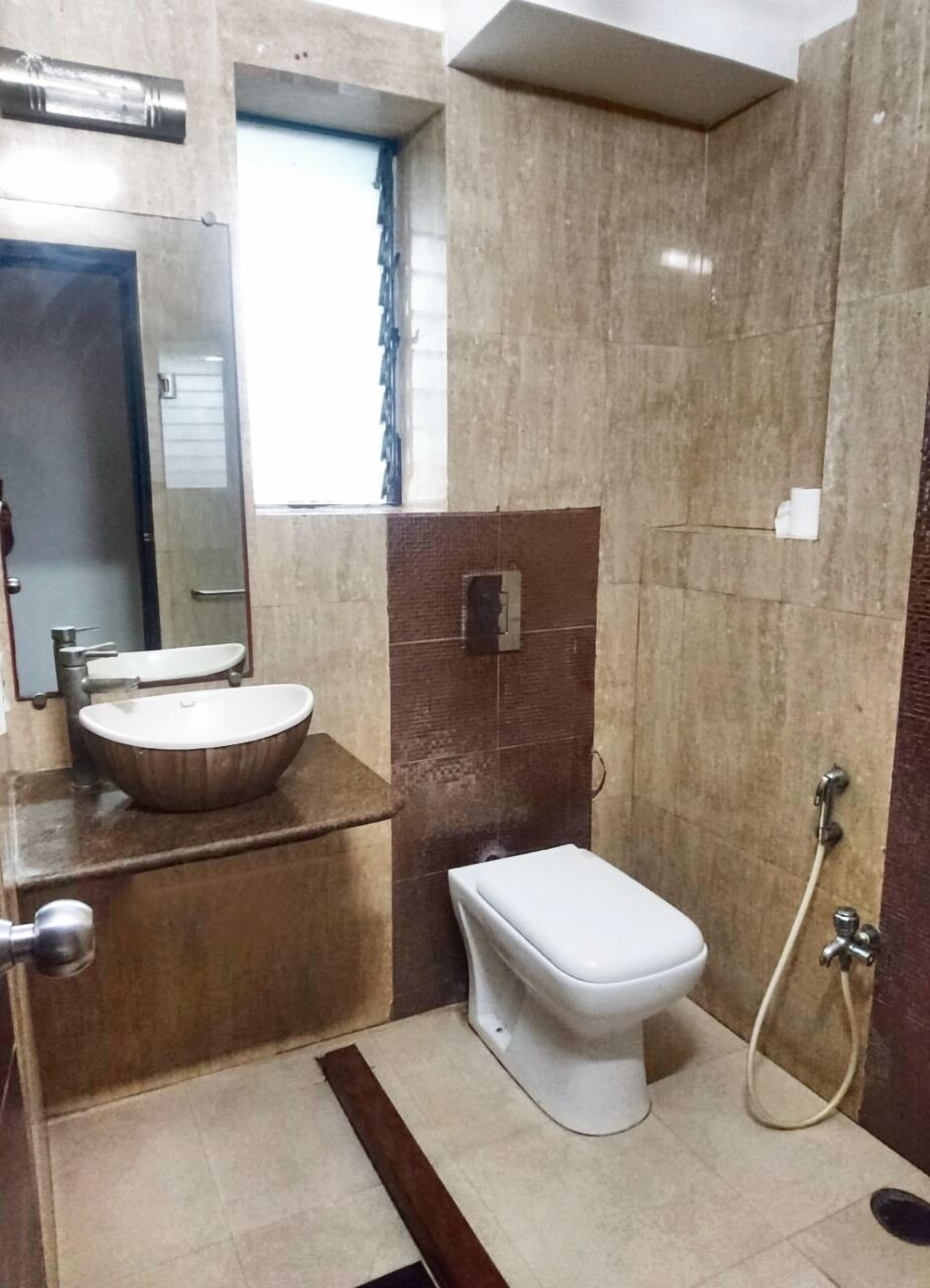 premium queen-size room | bathroom | shower, free toiletries, hair dryer, towels