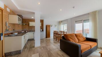 Apartment, 2 Bedrooms | Living room | Flat-screen TV