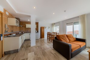 Apartment, 2 Bedrooms | Living room | Flat-screen TV