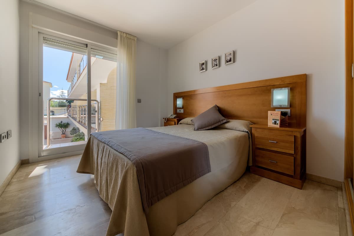 Apartment, 1 Bedroom | In-room safe, iron/ironing board, free cribs/infant beds, free WiFi