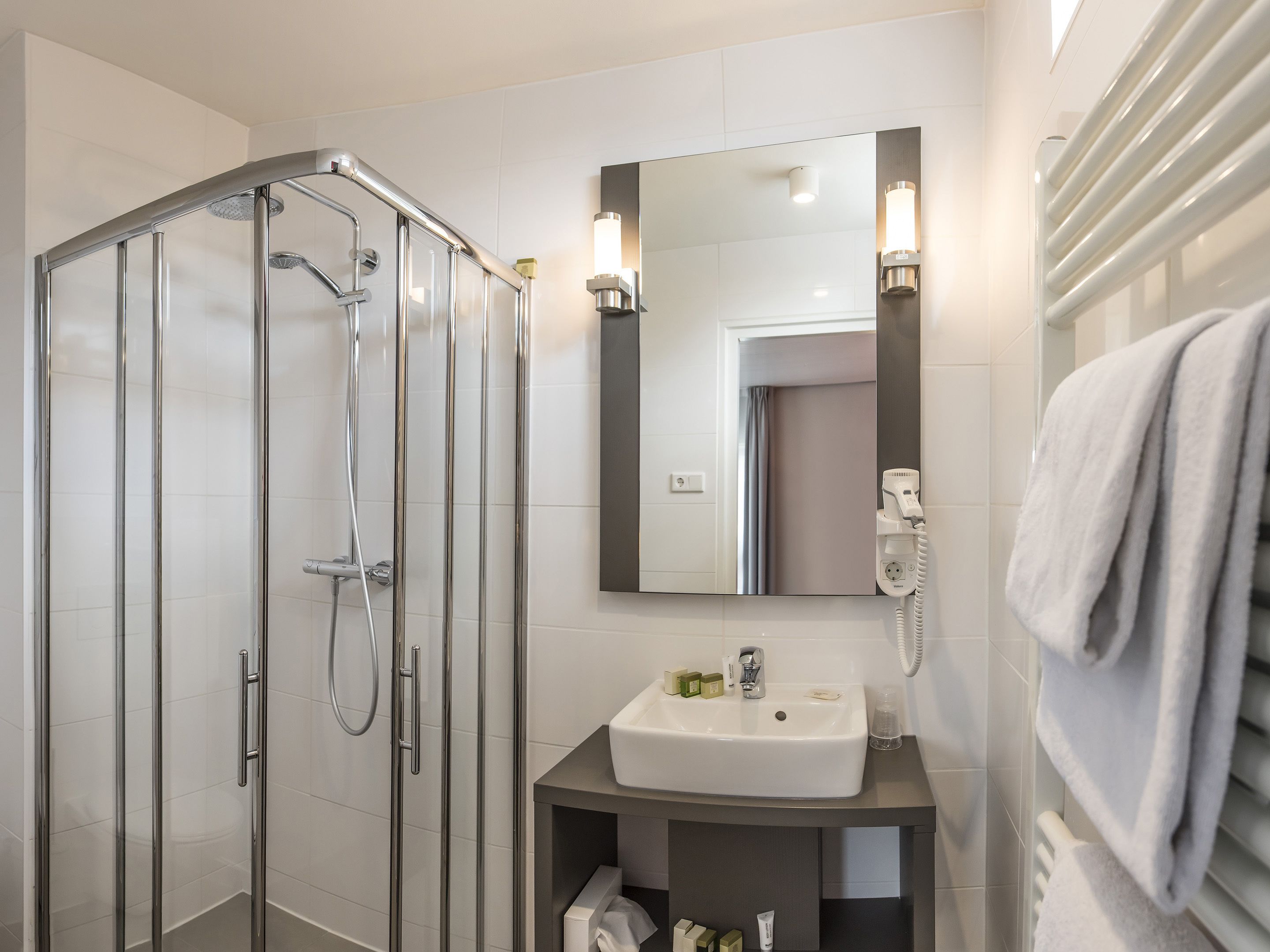 standard room | bathroom | shower, free toiletries, hair dryer, towels