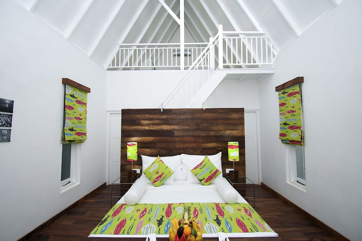 deluxe attic/family room | 1 bedroom, minibar, in-room safe, desk