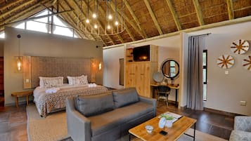 Luxury Suite, 1 King Bed, Hot Tub | 1 bedroom, minibar, in-room safe, individually decorated