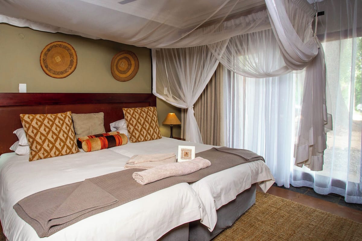Standard Twin Room | 1 bedroom, minibar, in-room safe, individually decorated