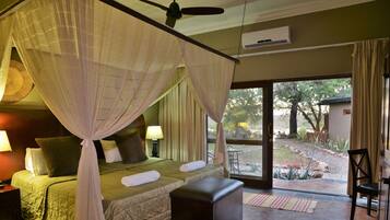 Chambre Deluxe | 1 chambre, minibar, coffres-forts dans les chambres