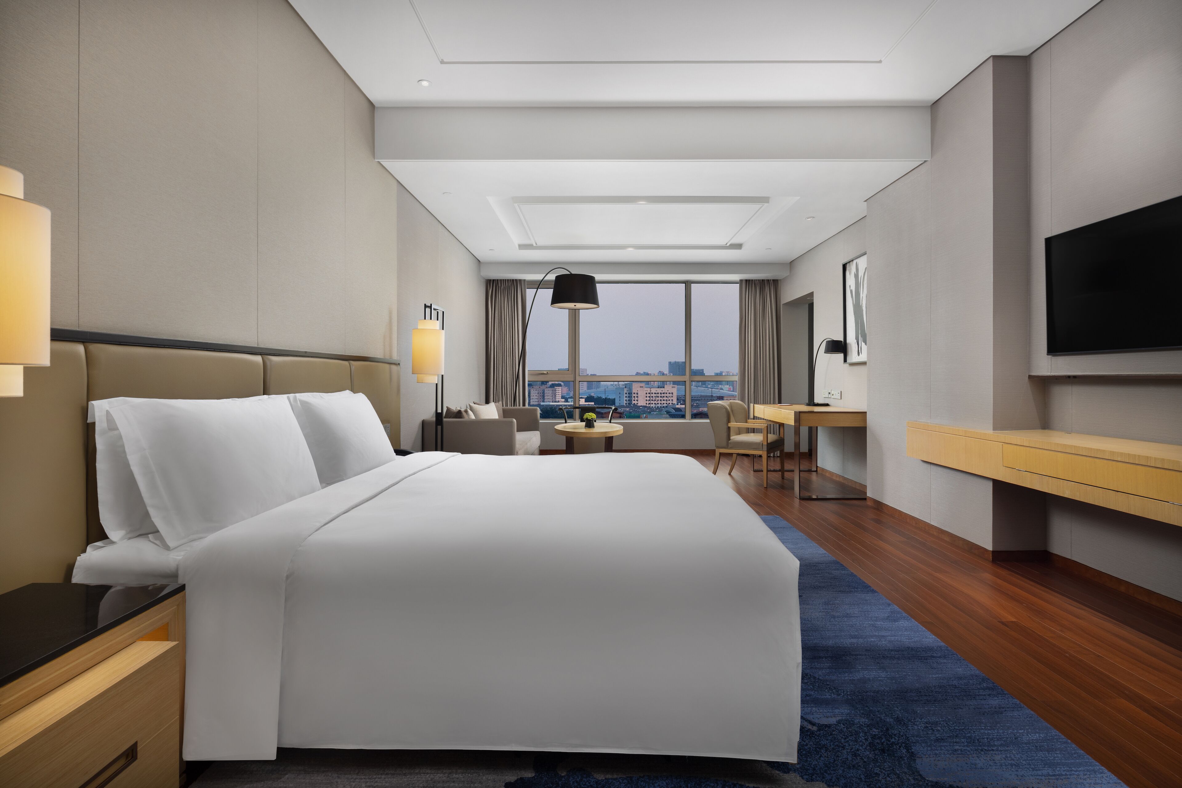 Premium bedding, down comforters, pillowtop beds, in-room safe