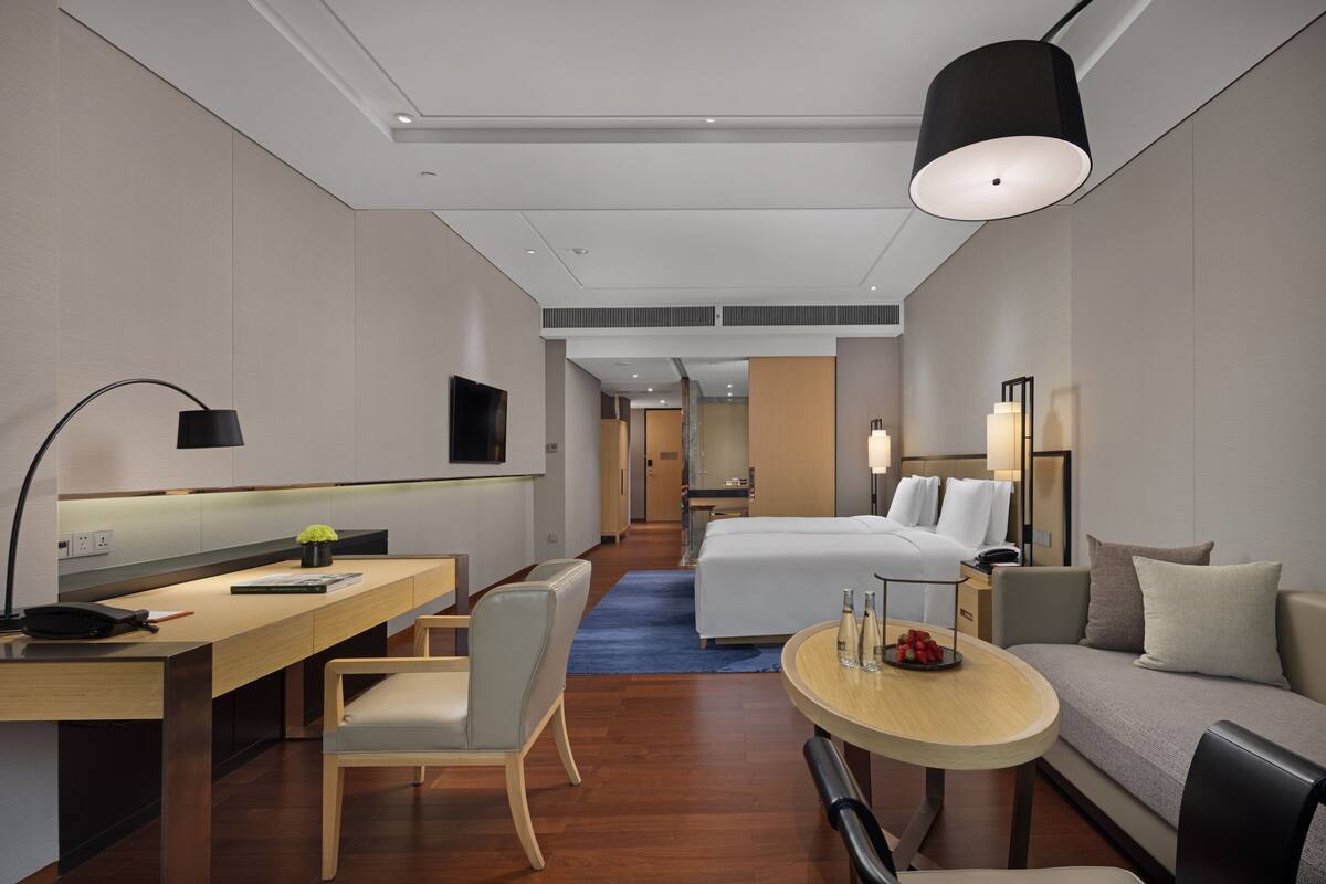 Premium bedding, down duvets, pillow-top beds, in-room safe