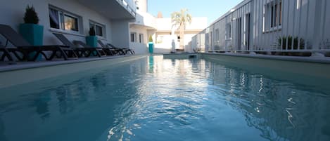 Seasonal outdoor pool, sun loungers