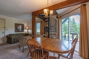 Two Story Two Queen Balcony | Living area | 32-inch TV with cable channels, foosball