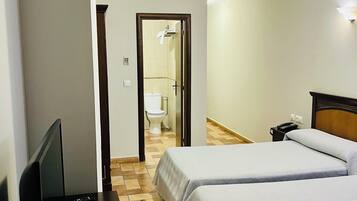 Individually furnished, desk, blackout drapes, iron/ironing board