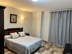 Individually furnished, desk, blackout curtains, iron/ironing board