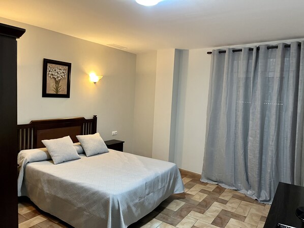 Individually furnished, desk, blackout curtains, iron/ironing board