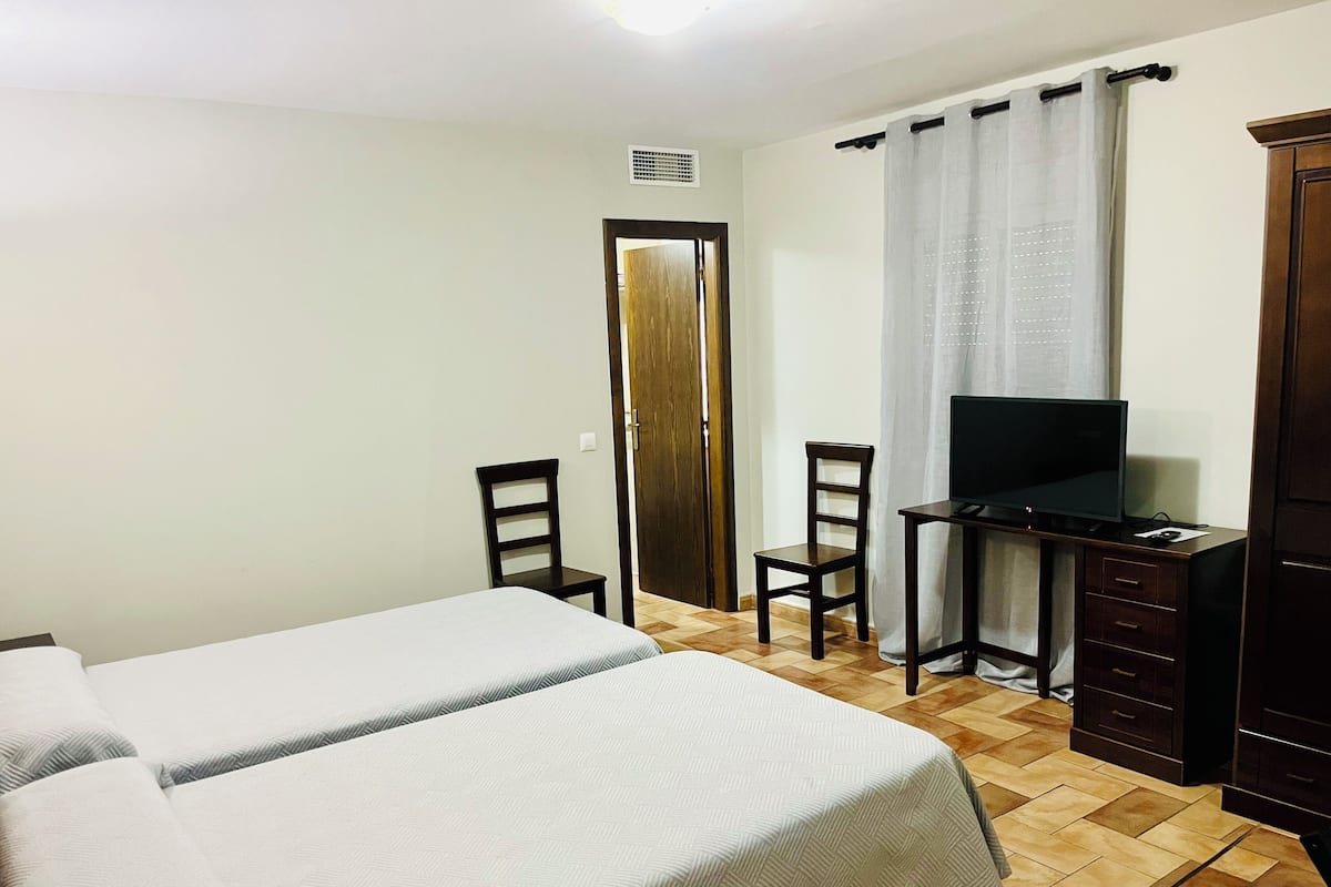 Desk, blackout drapes, iron/ironing board (on request), WiFi (free)
