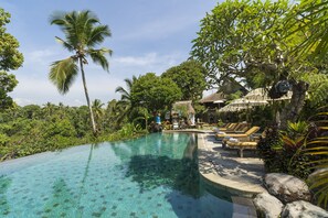 Outdoor pool, pool umbrellas, sun loungers