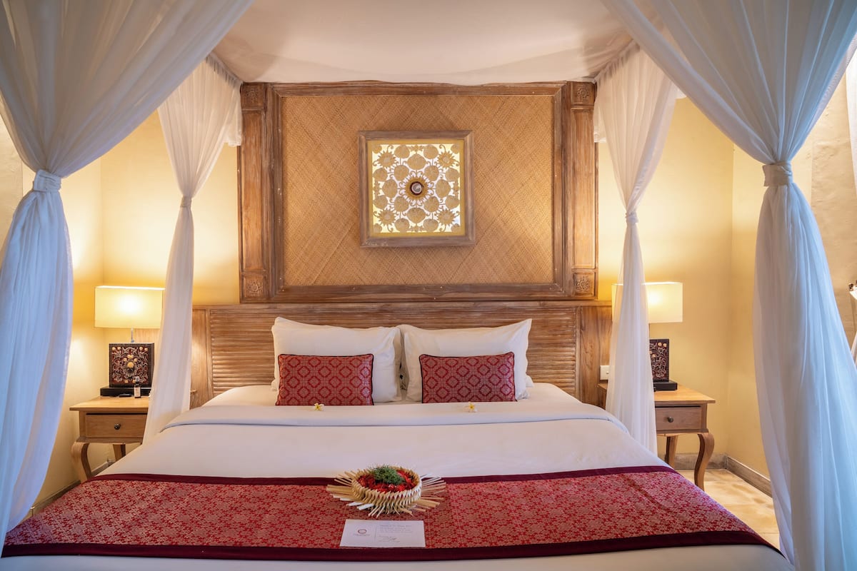 Suite Room Garden | 1 bedroom, minibar, in-room safe, individually decorated