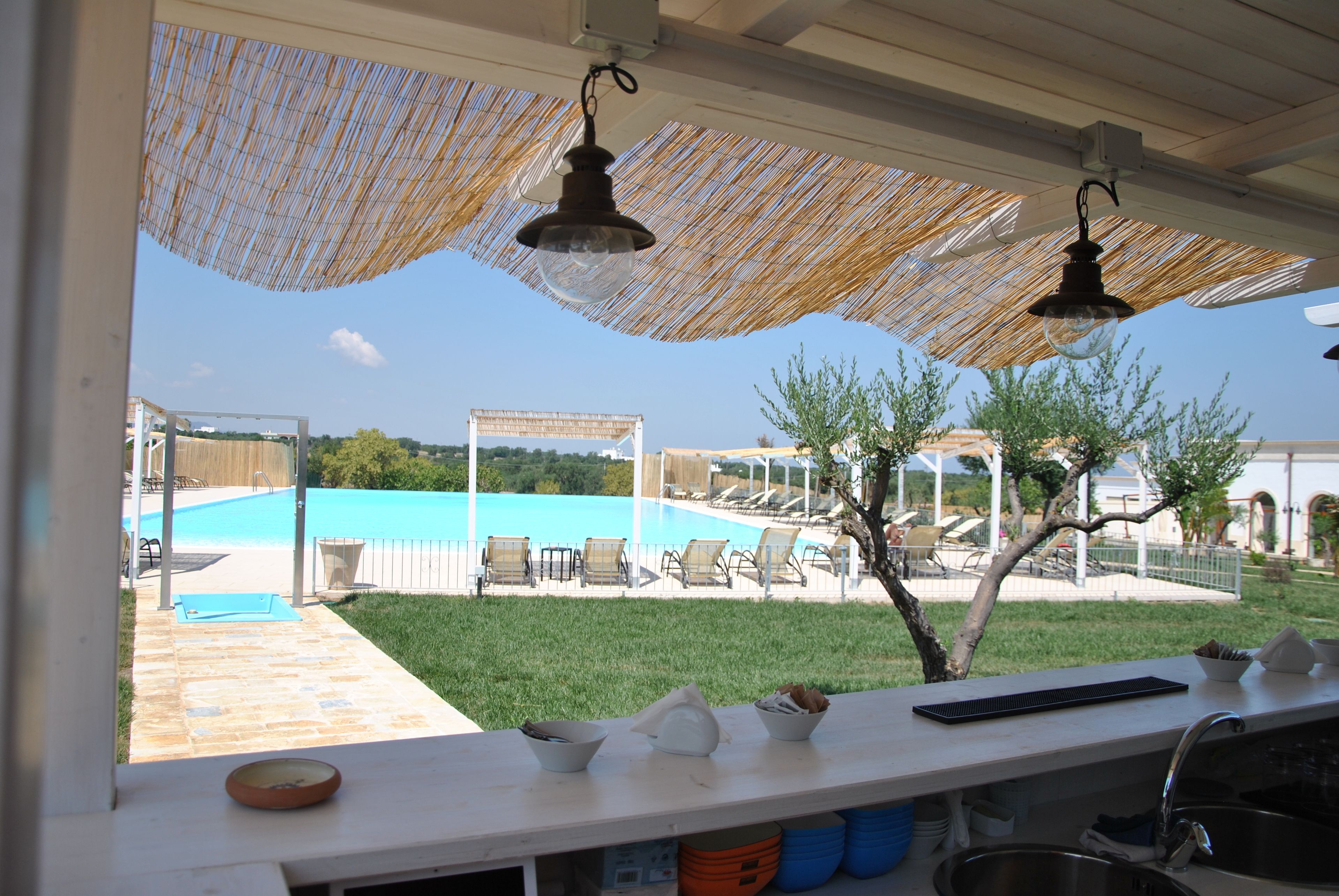 Seasonal outdoor pool, pool umbrellas, pool loungers