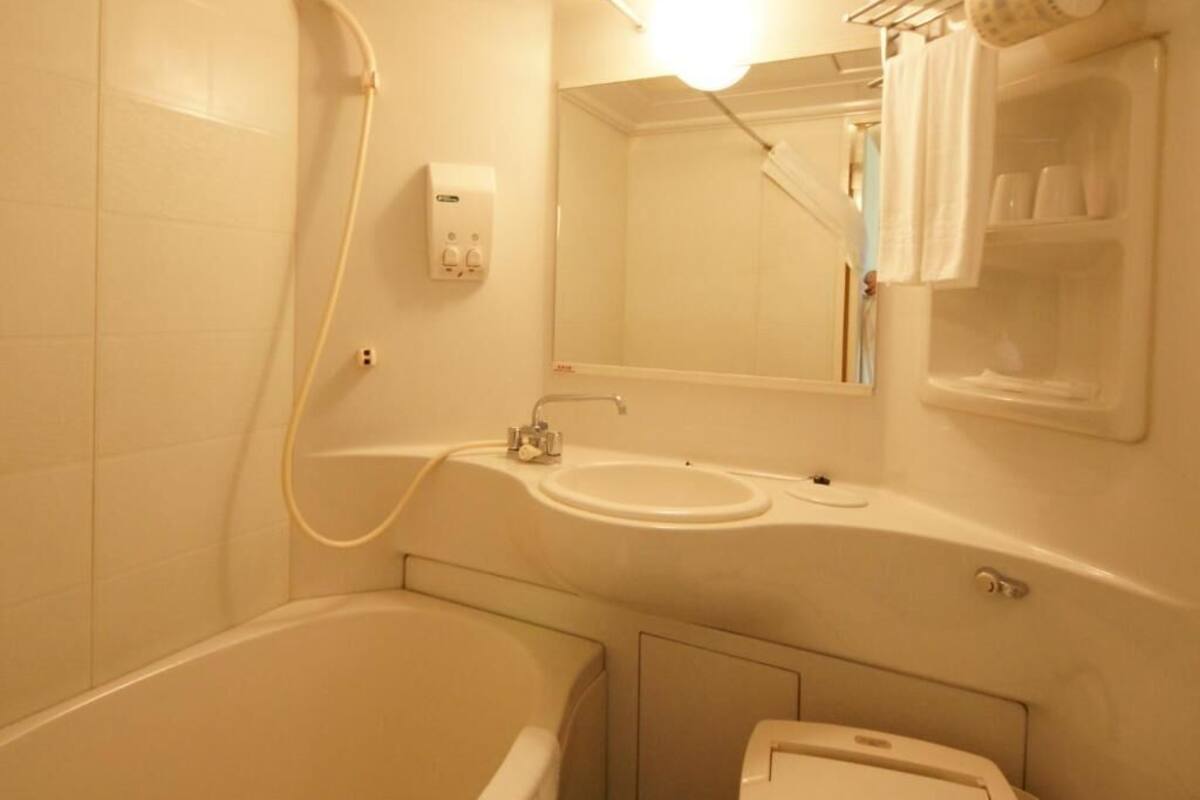 Bathroom | Free toiletries, hair dryer, slippers, bidet