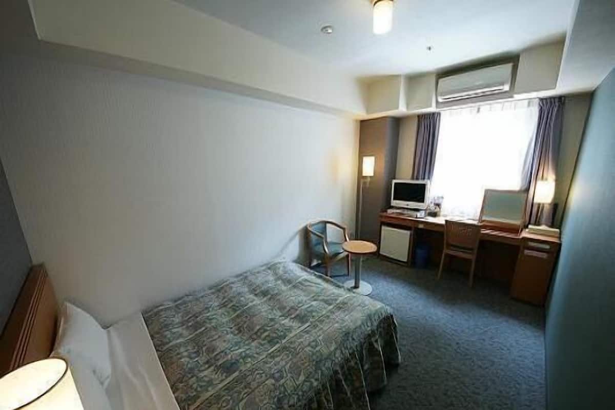Desk, blackout drapes, WiFi (free), bed sheets