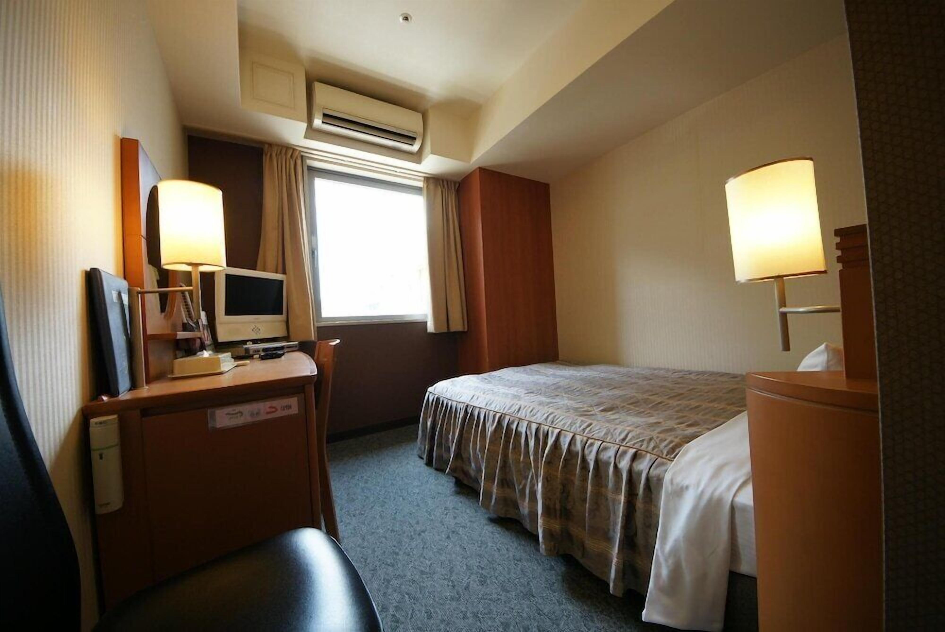 Desk, blackout drapes, free WiFi, bed sheets