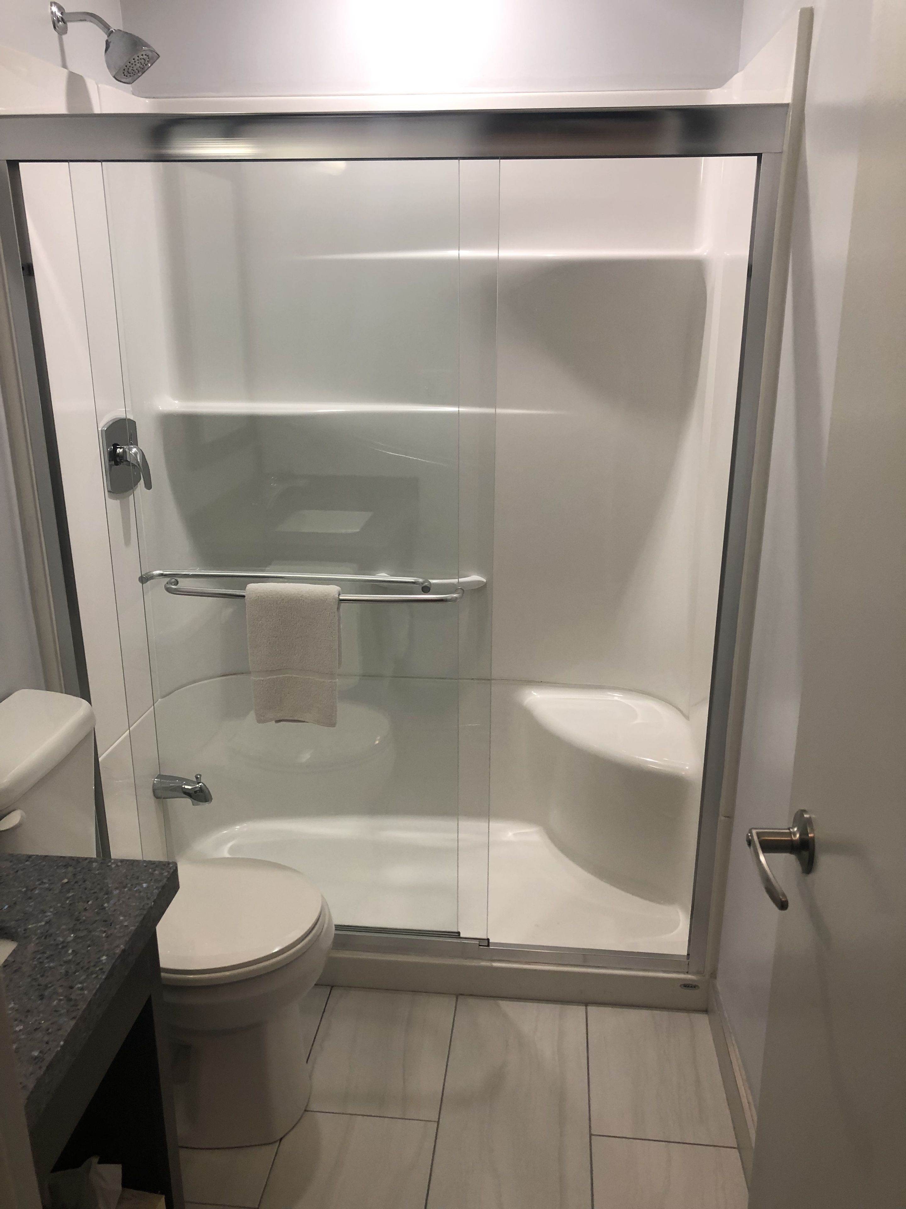 combined shower/bathtub, free toiletries, hair dryer, towels