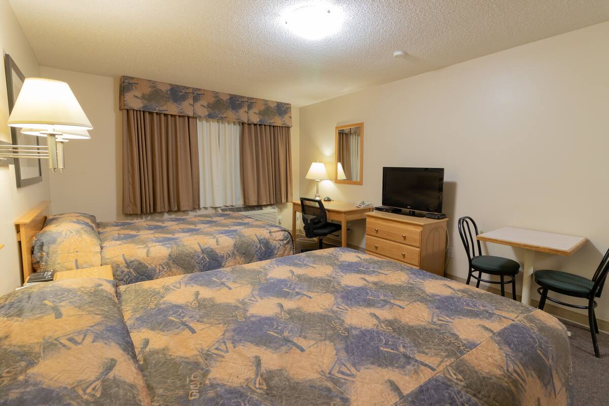 Desk, laptop workspace, WiFi (free), bed sheets