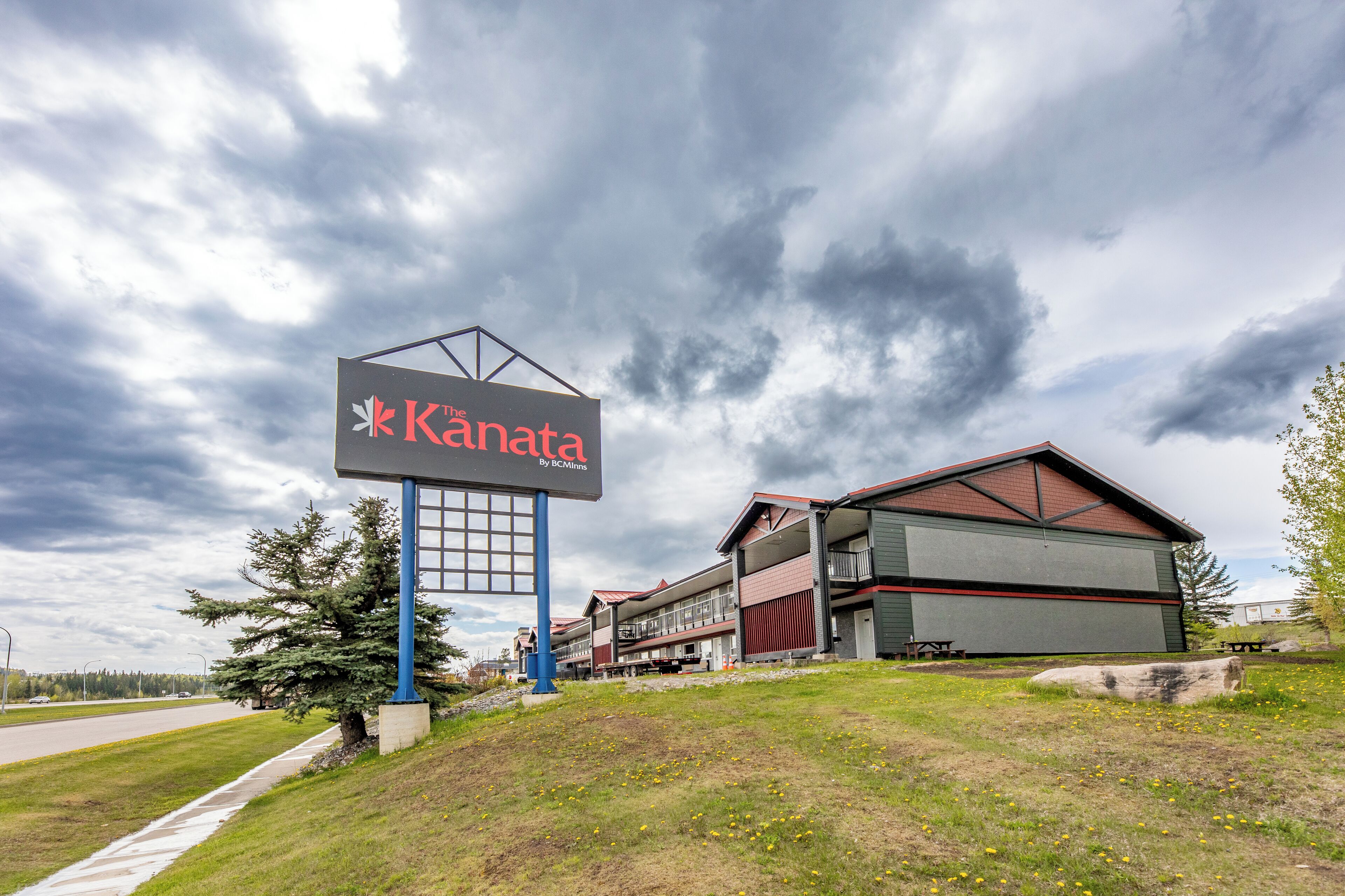 A building with a large sign reading "Kanata by BCMINAT".
