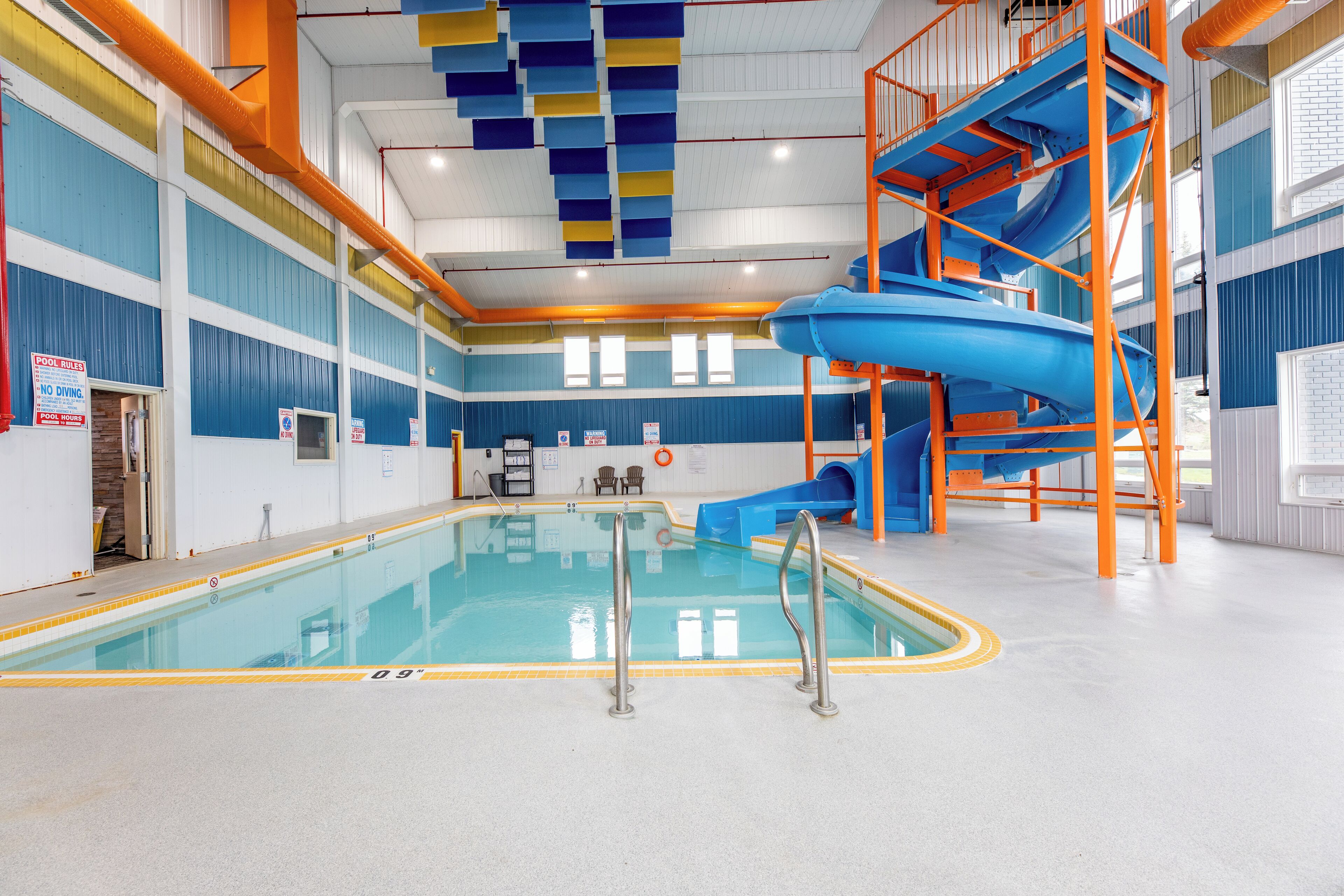 indoor pool, open 9:00 am to 10:00 pm, pool loungers