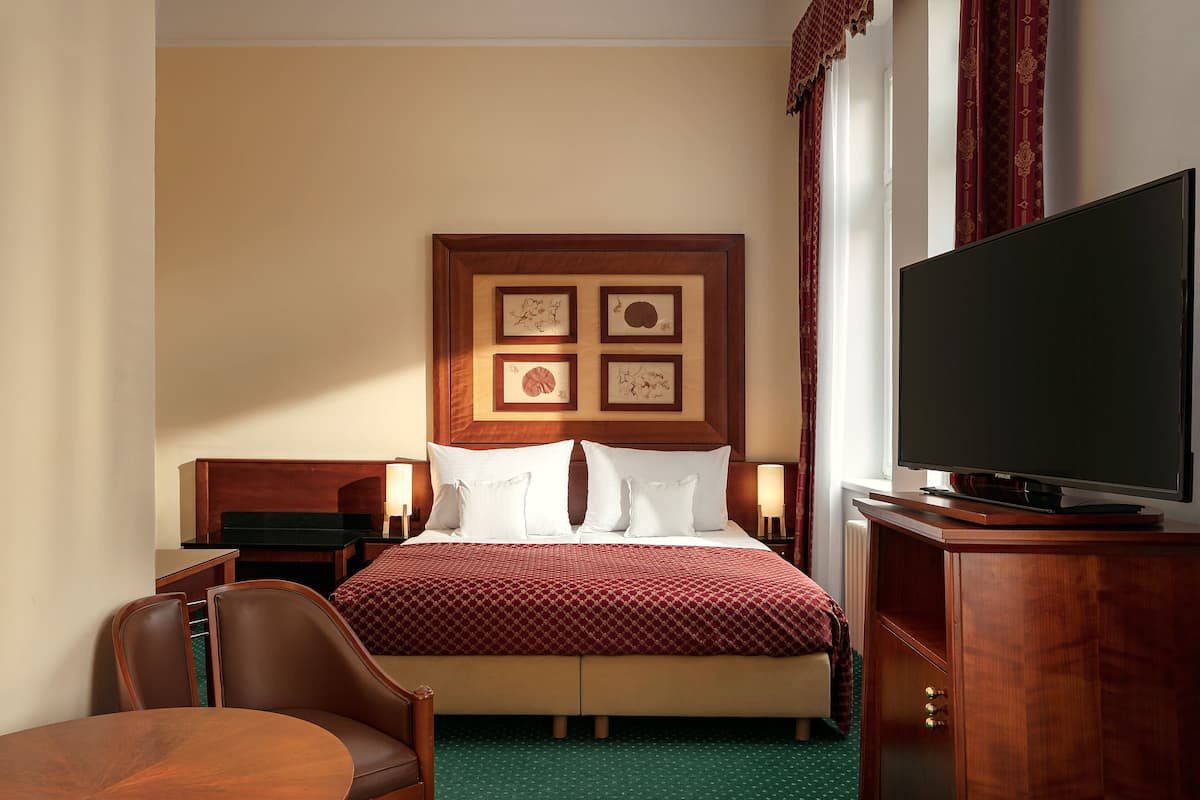 1 habitación, ropa de cama hipoalergénica y minibar