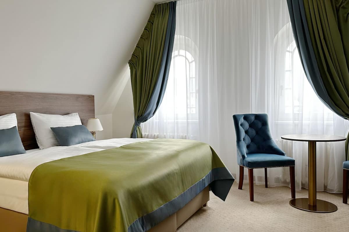 1 habitación, ropa de cama hipoalergénica y minibar