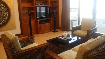 Penthouse Suite | Living area | TV